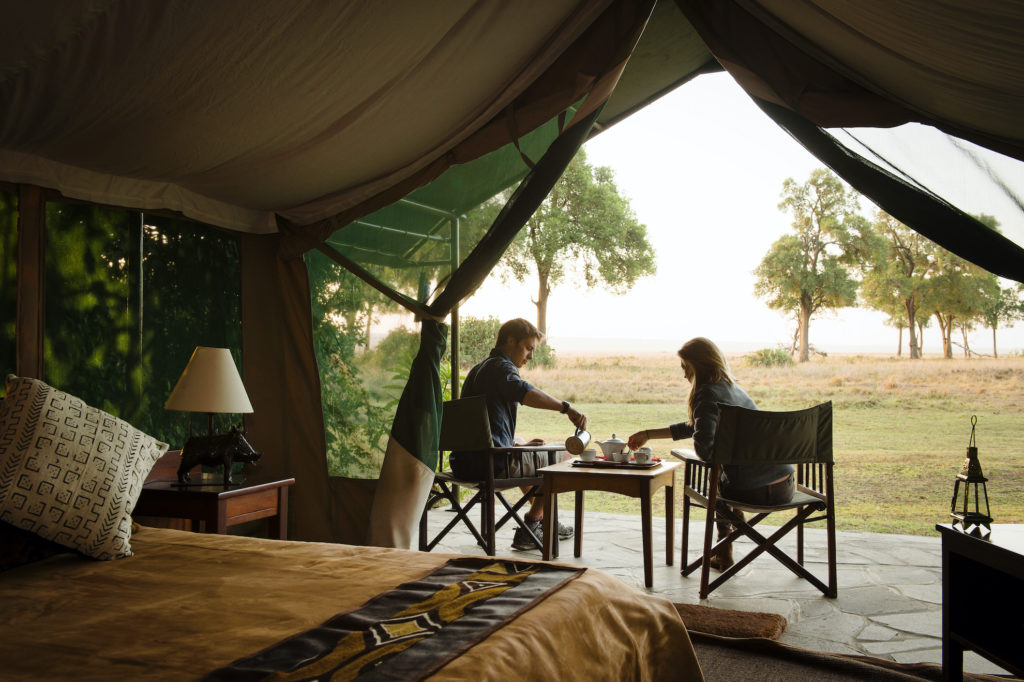 Kenya - Masai Mara National Reserve - 12890 - Couple on Decking in Tent