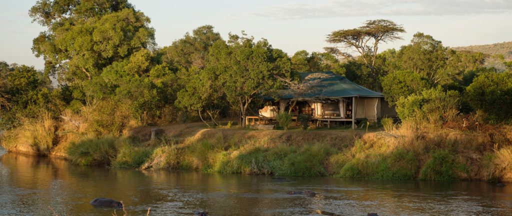 Kenya - Mara North Conservancy - 12890 - View of Lodge from River