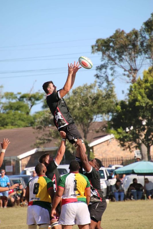 Rugby line-out in South Africa with player catching ball