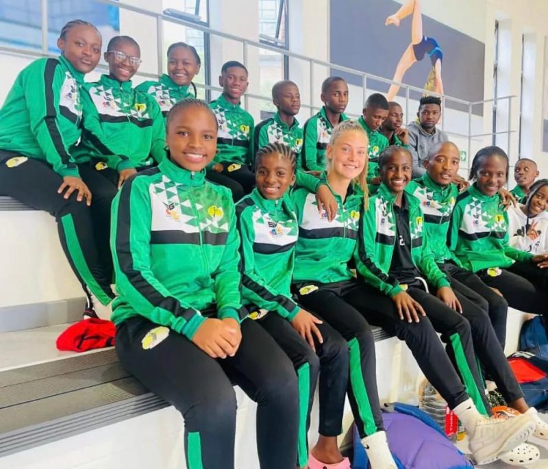 Group of hockey players in South Africa wearing green sports kit