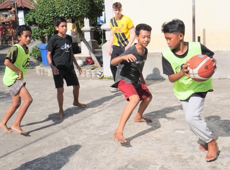 Children in Indonesia playing basketball