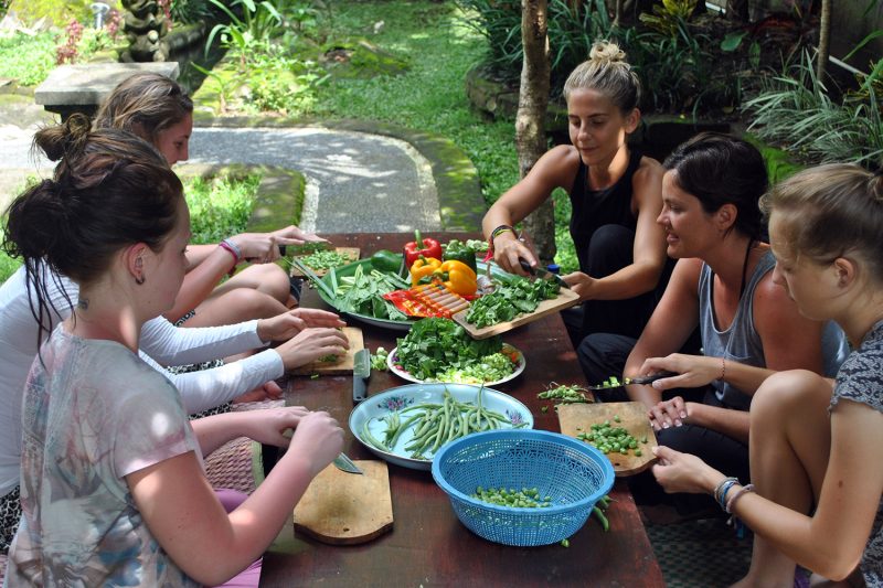 Group of people in Indonesia making food together